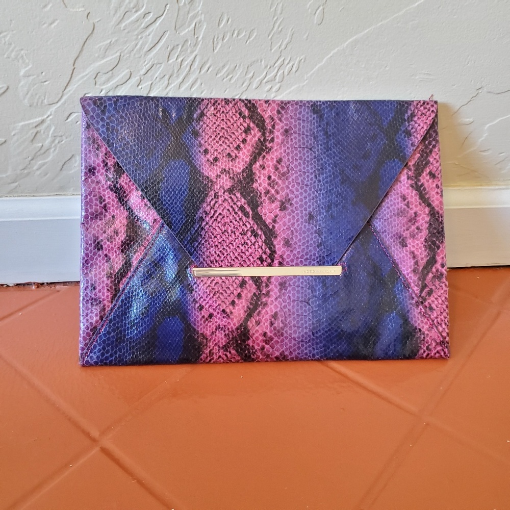 BCBGMaxAzria Snake Embossed Clutch